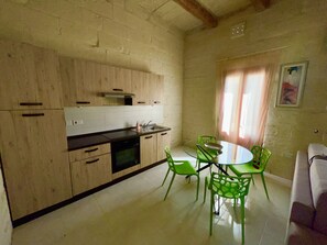 Fridge, stovetop, coffee/tea maker, toaster