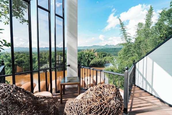 Habitación Deluxe doble, vistas al río | Zona de estar