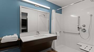 Suite, 1 Queen Bed, Accessible, Non Smoking | Bathroom | Combined shower/tub, rainfall showerhead, soap, shampoo