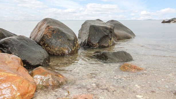 A rocky shoreline with large boulders and clear water. - "Radojka" - 75m from the sea by Interhome (Otterup)