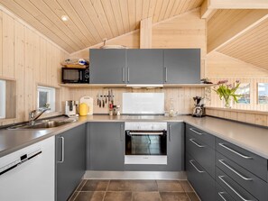 Fridge, microwave, dishwasher, cookware/dishes/utensils