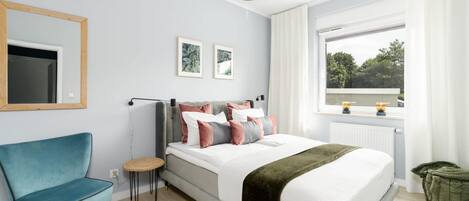 1 slaapkamer, een strijkplank/strijkijzer, wifi, beddengoed