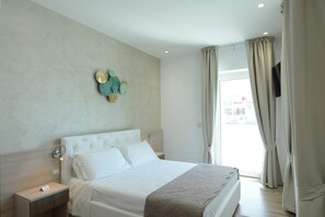 Family Room | Premium bedding, down duvets, memory-foam beds, minibar
