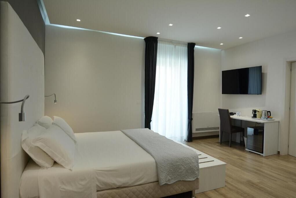 Luxury Quadruple Room, 1 Bedroom | Premium bedding, down comforters, memory foam beds, minibar