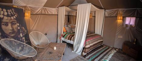 Deluxe Tent | Individually decorated, individually furnished, bed sheets