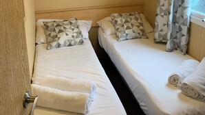 Chalet, Multiple Beds | 3 bedrooms, iron/ironing board, WiFi (free), bed sheets - 3-bed Caravan in Newquay (Newquay)