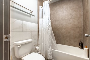 Bathtub, hair dryer - Suite 302 - Updated 1BR Apartment on First Floor (Rapid City)