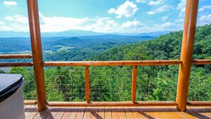 A wooden deck with a view of a forested mountain range. - Starry Starry Night: Count Stars, Not Worries (Sevierville)