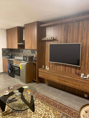 Appartamento Deluxe, vista città | Area soggiorno