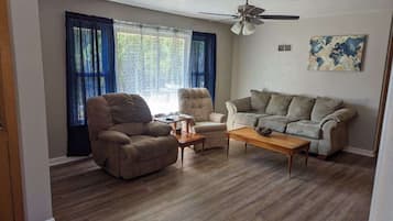 TV, fireplace, books, offices