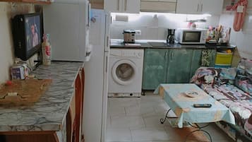 Fridge, microwave, stovetop, coffee/tea maker