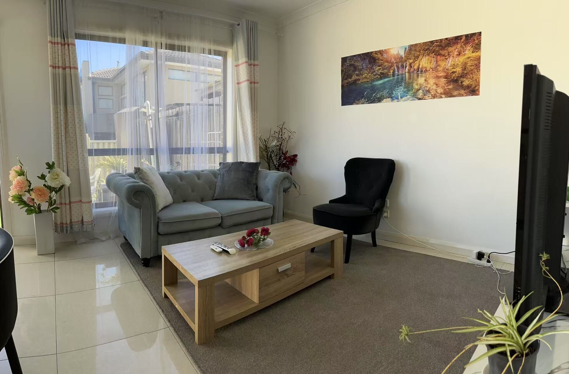 Classic Townhome | Living area | 24-inch LED TV with digital channels, pay movies