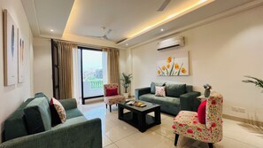 Luxury Triple Room | Living area - BluO 3BHK Golf Course Road Balcony Lift  (Gurugram)