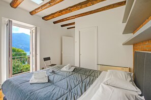 Standard Apartment, Multiple Bedrooms (Mirador Del Lago) | 2 bedrooms, in-room safe, laptop workspace, iron/ironing board - Mirador Del Lago (Lugano)
