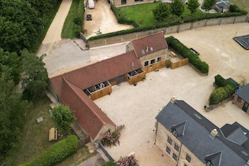 An aerial view of the cottages on the grounds at Little Calf Cottage, Wiltshire