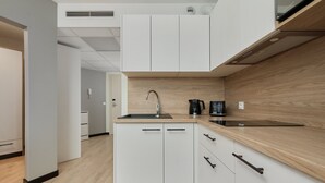 Coffee/tea maker, microwave, cookware/dishes/utensils, dining tables - Apartament With AC Dyrekcyjna Wrocław (Wroclaw)