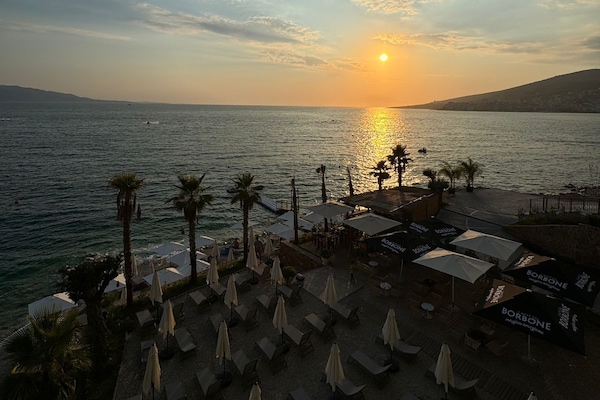 Private beach, sun loungers, beach umbrellas, beach towels