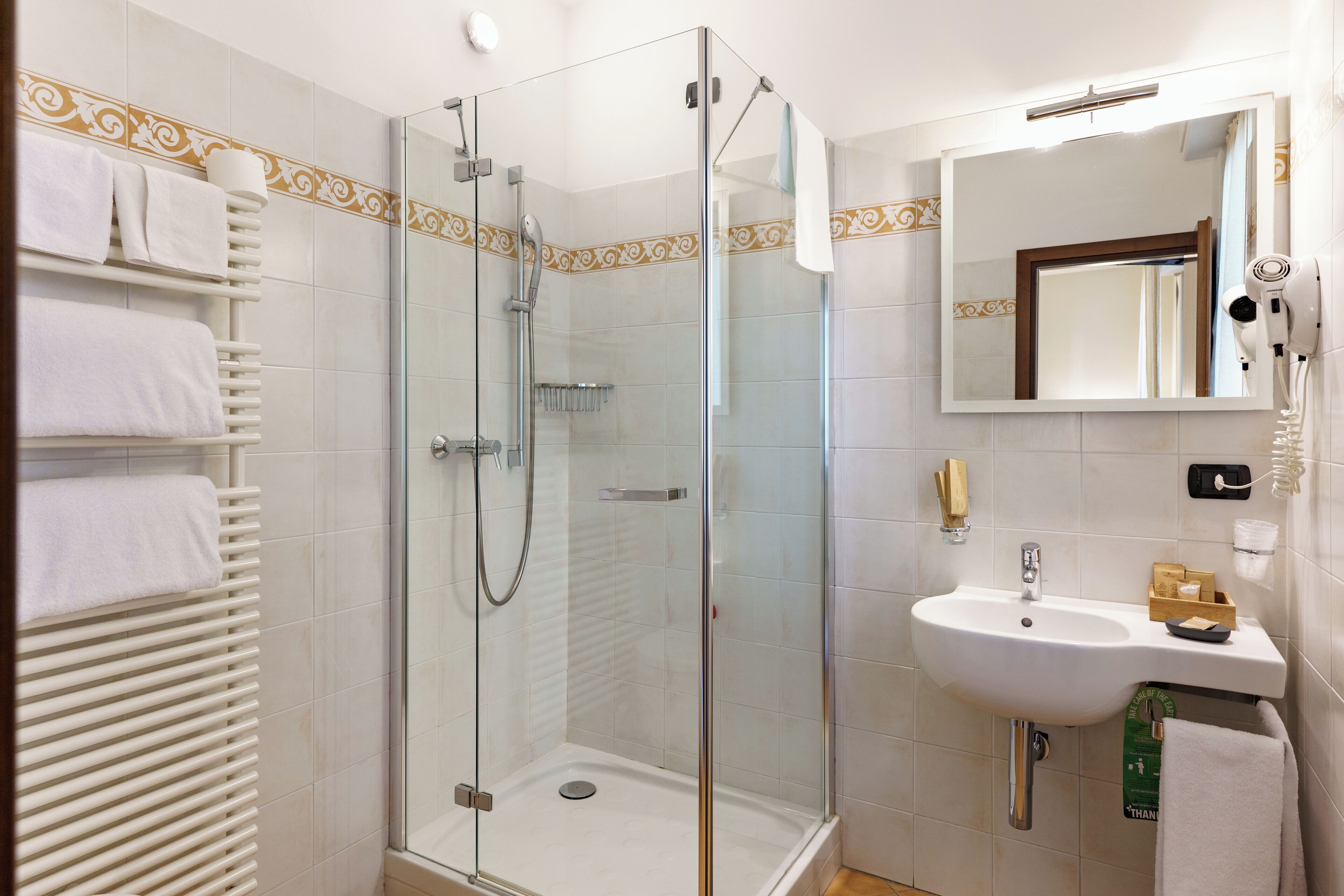 Rainfall showerhead, designer toiletries, bathrobes, bidet