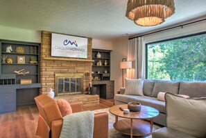 Smart TV, fireplace, books