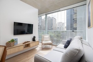 Apartamento | Área de estar | TV