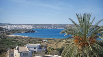 Enjoy breathtaking views of the sea and cityscape from this serene coastal retreat.