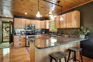 Fridge, microwave, oven, stovetop - ✨ 25% Off Premium Mountain View Cabin • “⭐ Guest Favorite" rated in the Top 5% of all  Airbnb properties   • Hot Tub • Fire Pit • Porch Swing • Close to WCU (3 Mi), Sylva restaurant, pubs, and shopping, and the Blue Ridge Parkways and many adventures. (Sylva)