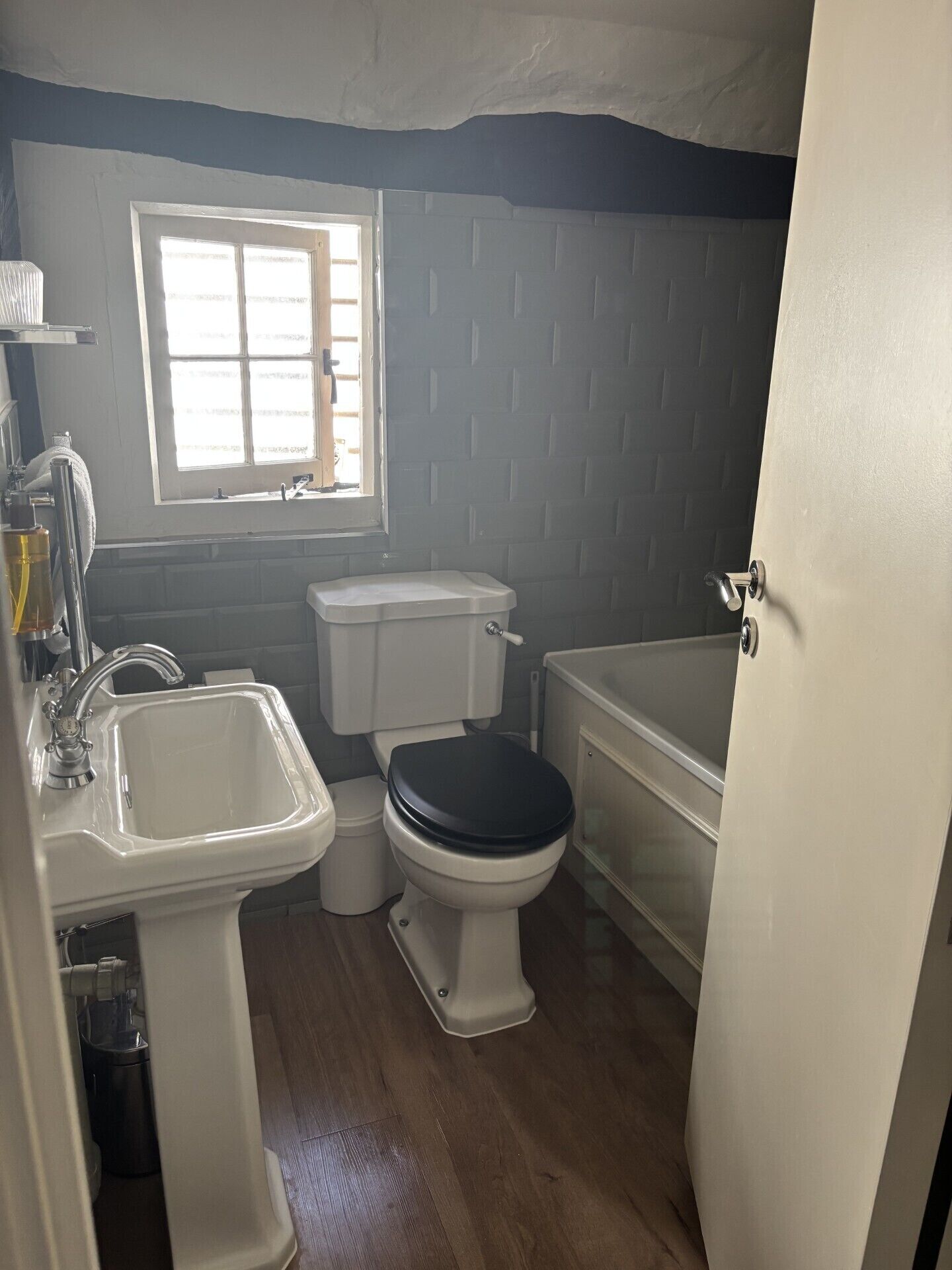 Shower, rainfall showerhead, hair dryer, towels