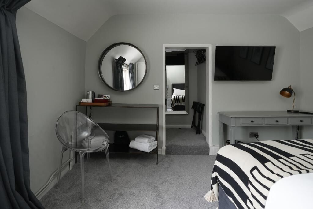 Individually decorated, desk, laptop workspace, blackout drapes