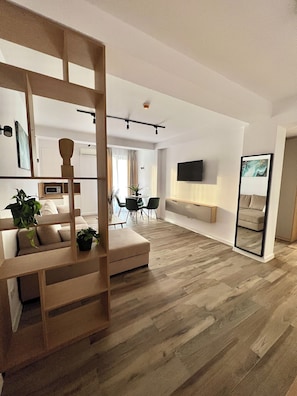 Deluxe Apartment, Non Smoking, City View | Living area | 108-cm flat-screen TV with digital channels, TV, smart speakers - Aparthotel Atmosphere (Eforie)