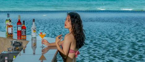 Indoor pool, open 7:00 AM to 9:00 PM, pool umbrellas, sun loungers