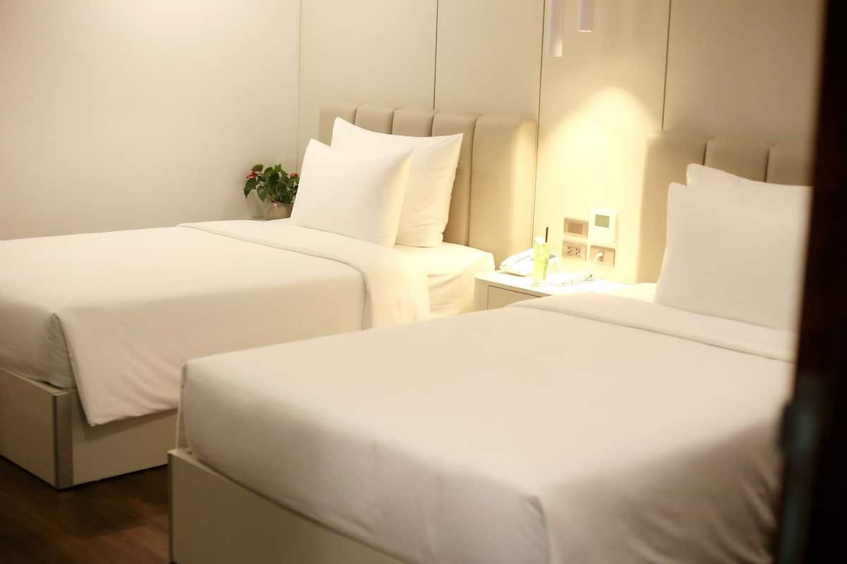 Habitación superior con 2 camas individuales | Ropa de cama de alta calidad y minibar