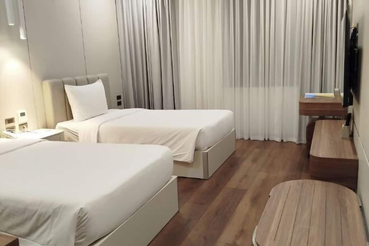 Ropa de cama de alta calidad y minibar