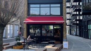 A building with a sign reading "GAIL'S" above the entrance. - Luxury Urban Oasis: with Garden and Private Studio (London)