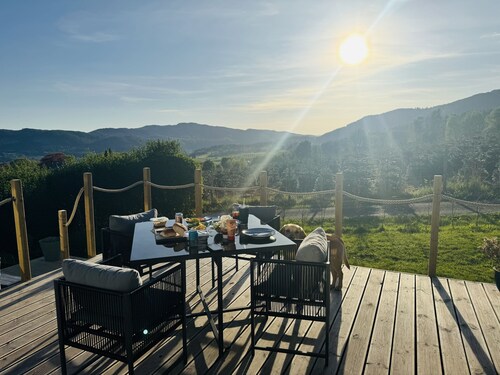 Spacious Lodge with woodburner, hot tub and beautiful views from the patio deck.