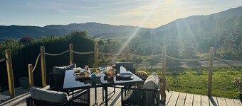 Spacious Lodge with woodburner, hot tub and beautiful views from the patio deck.