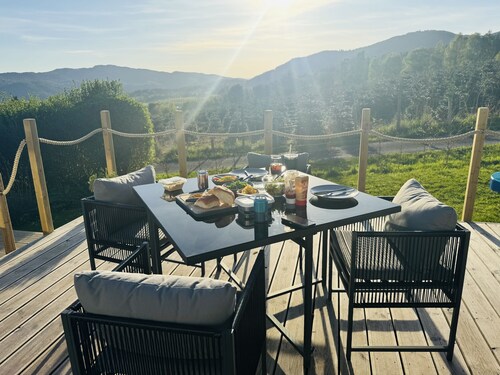 Spacious Lodge with woodburner, hot tub and beautiful views from the patio deck.