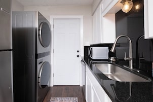 Apartamento Deluxe | Lavandería