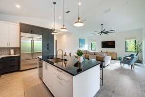 Fridge, microwave, stovetop, dishwasher - Contemporary Naples Home w/ Outdoor Kitchen & Pool (Naples)
