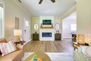 TV, fireplace, books