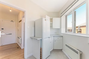 Apartment | Private kitchen | Fridge, microwave, oven, stovetop