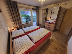 4 bedrooms, desk, iron/ironing board, travel cot