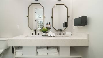 Hair dryer, towels, soap, shampoo