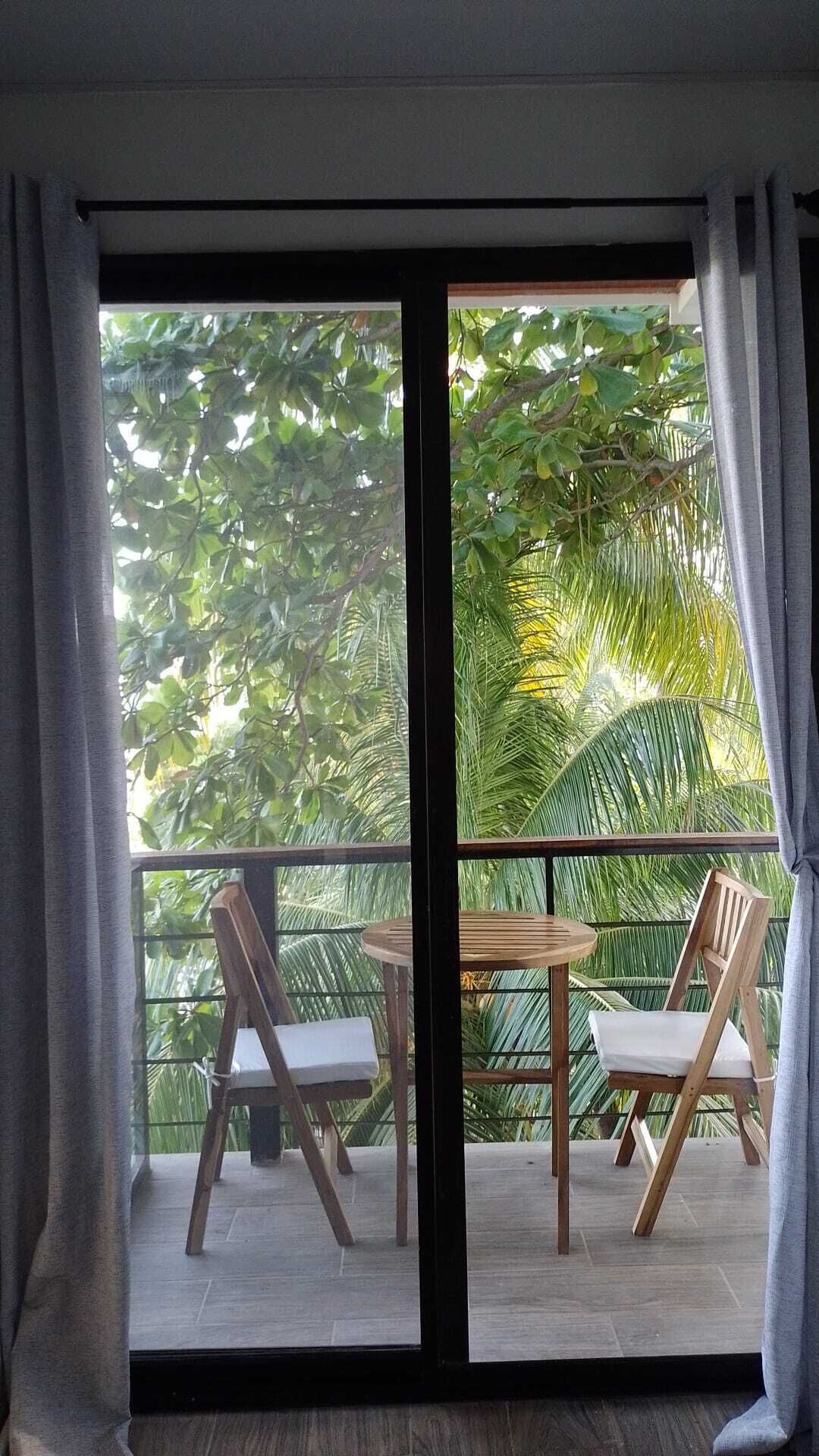 Deluxe Room, Balcony, Partial Ocean View | 1 bedroom, WiFi (free)