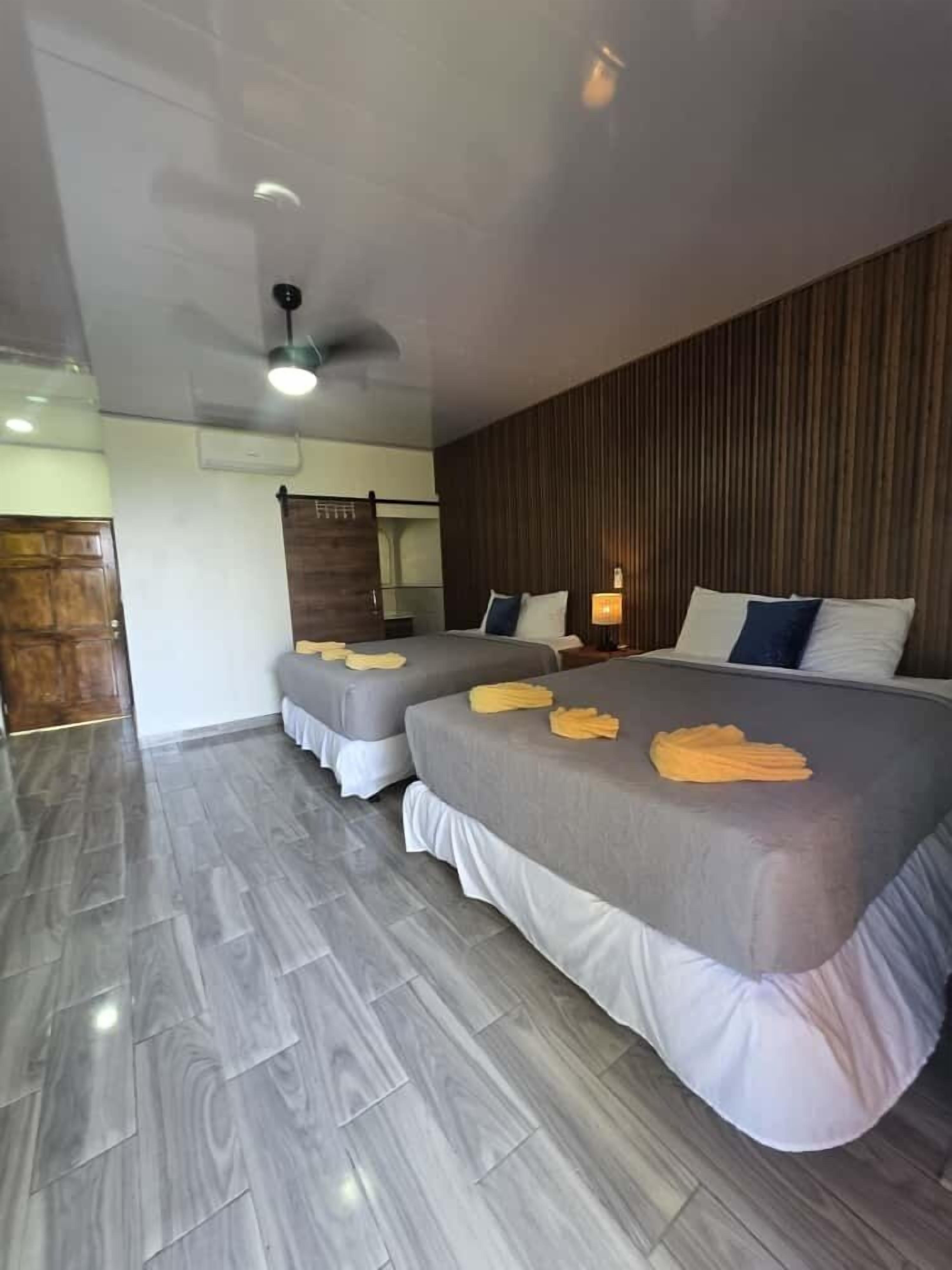 Deluxe Room, Balcony, Partial Ocean View | 1 bedroom, WiFi (free)