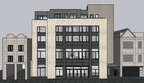 Stylish urban complex with large windows and unique architectural details.