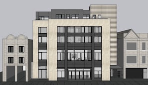 Stylish urban complex with large windows and unique architectural details.