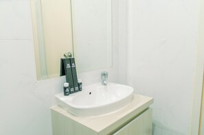Apartment | Bathroom | Shower, free toiletries, towels - Comfort And Serene 2Br At Urban Heights Apartment (South Tangerang)