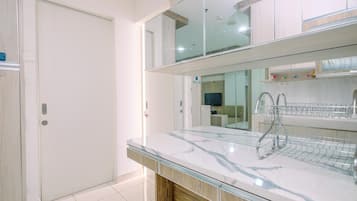 Departamento | Cocina privada | Refrigerador con congelador y parrilla de estufa