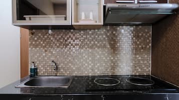Departamento | Cocina privada | Refrigerador con congelador y parrilla de estufa