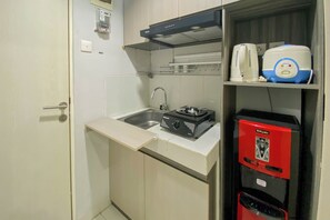 Departamento | Cocina privada | Refrigerador con congelador y parrilla de estufa